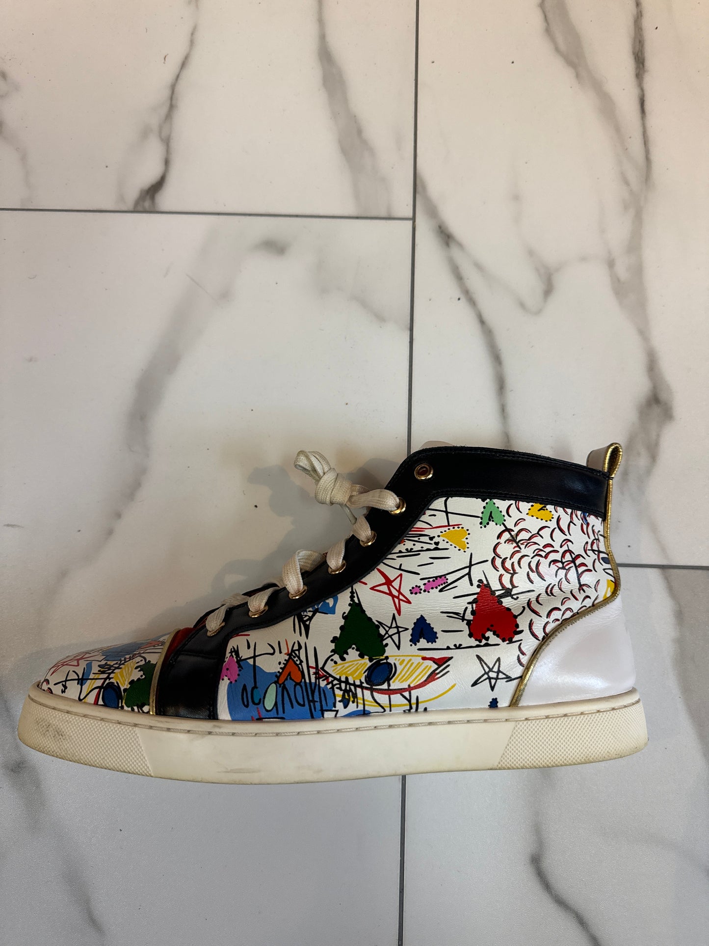 Louboutin High Top Used
