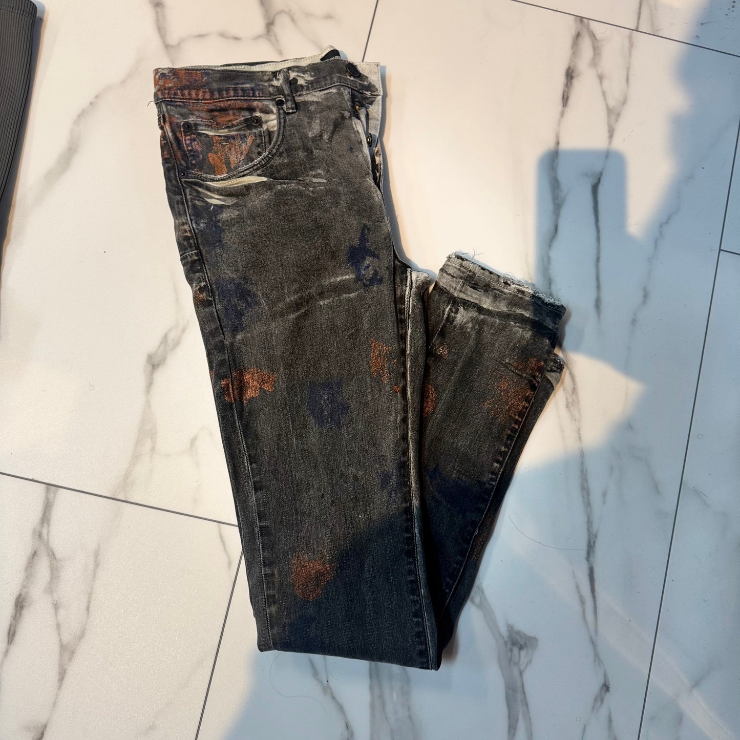 gray purple jeans w orange splattered paint
