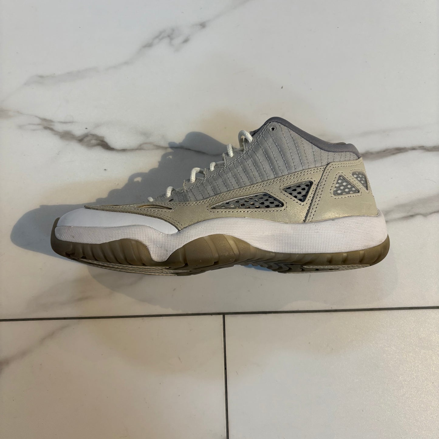 Jordan 11 grey hole