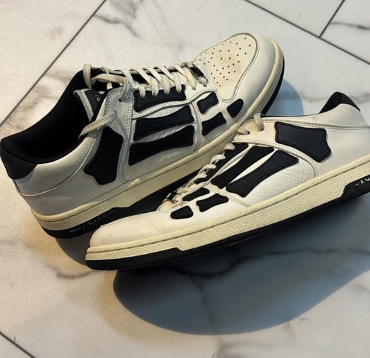 Amiri low top white and black fade